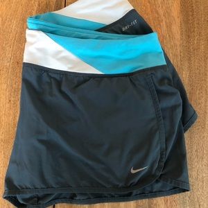 Grey Nike Dri-Fit running shorts